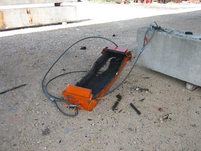 Containment box after the blast.  The forces tore the...