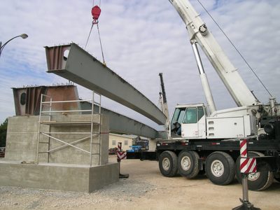 The second girder as it is lowered into place (note: the...