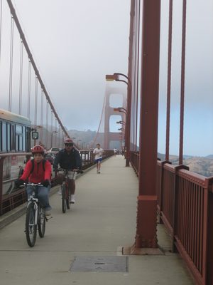 John's friend running back across the bridge