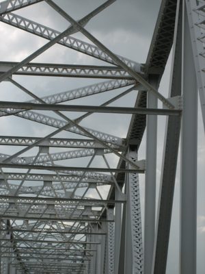 I'm pretty sure it's riveted construction.  Fun.