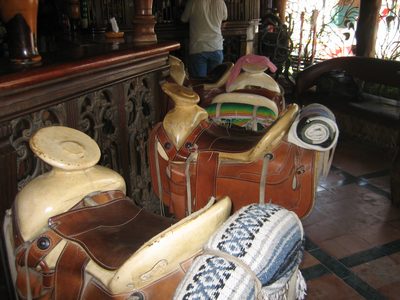 The barstools were western saddles.