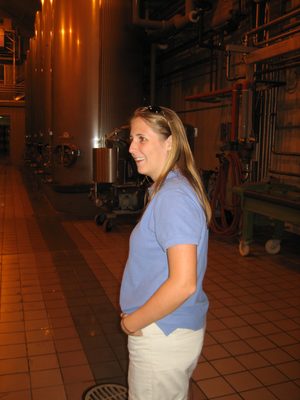 Catherine listens intently in the white wine room.