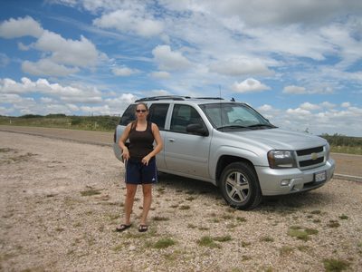 Catherine and the TrrailBlazer at a scenic overlook near...