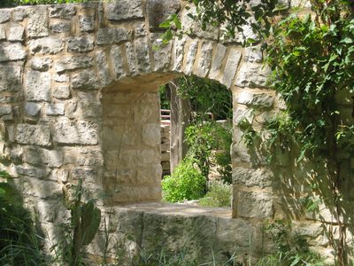 Looking back through the stone wall once more.