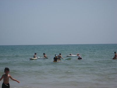 Attempting to surf, stand-and-paddle, etc.