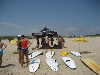 The Reef tent, Reef umbrellas, and Reef-sponsored girl (Molly).