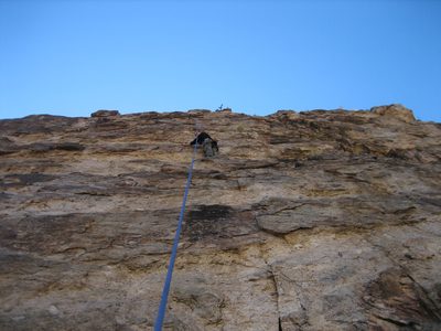 Catherine begins climbing again, with a prickly pear...