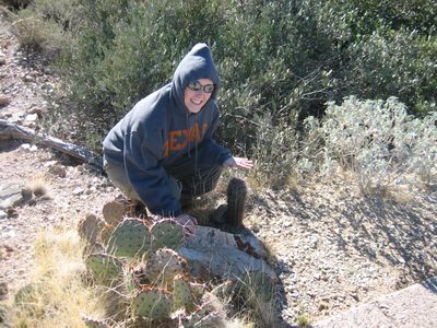Catherine with a "baby" saguaro at the Arizona-Sonora...