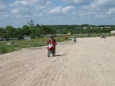 The group cruises around the warm-up area, getting a...