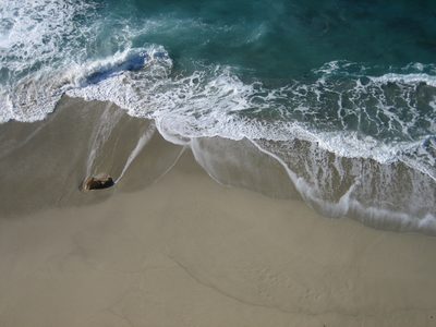 Beautiful undisturbed beach.  Or, a great desktop background.