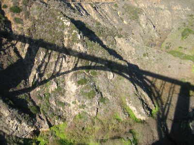 The Bixby Bridge, shadowed onto the valley below.