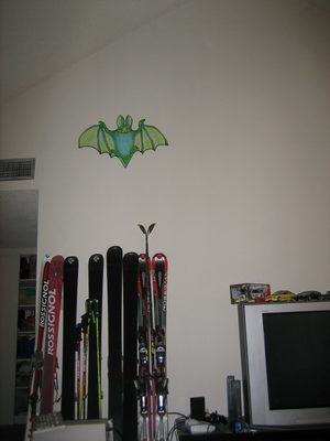 Mr. Bat watches over the living room and protects the skis.