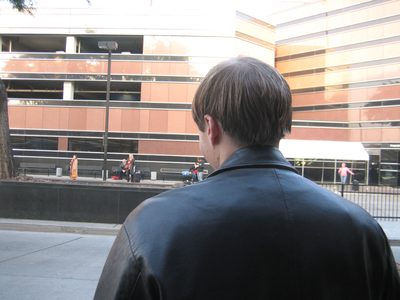 The back of John's awesome haircut, at the airport.