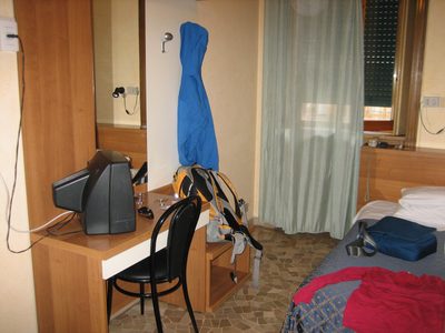 Hostel room - bed, desk, window