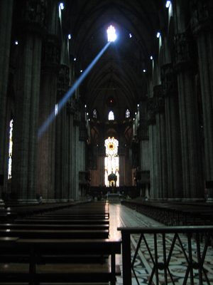 One beam of light was streaming through one of the...