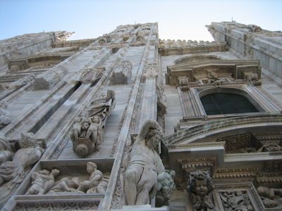 Looking up the front facade of the Duomo.