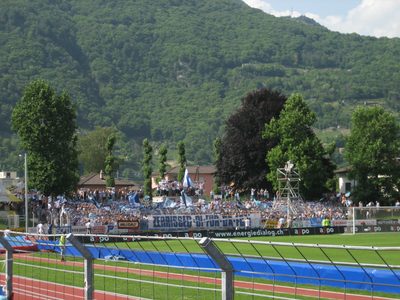 Zurich fans, contained to one end of the stadium, with...