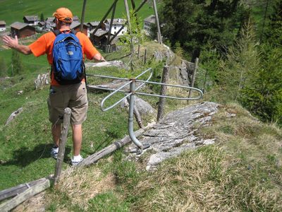 Tommy walking through a bizarre cattle-guard of sorts. ...