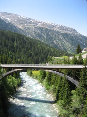 A glu-lam (wood) arch bridge into Innerferrera.