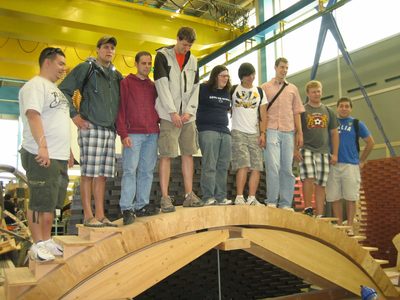 Half the group stands on an unreinforced, unconnected...