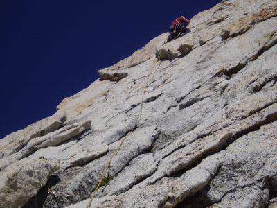 Colin placing a piece on the first pitch of Cathedral Peak.
