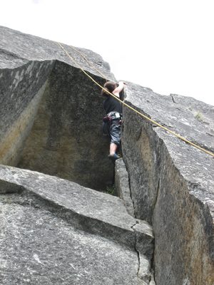 Rachel climbing over the roof on Ko Ko Box.