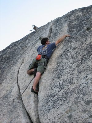 Eliah crack climbing.