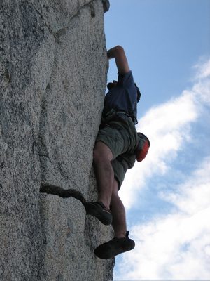 Eliah crack climbing.