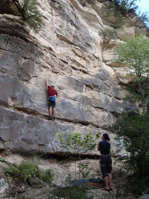 Jay seconding a 5.10 route, while Monica belays.