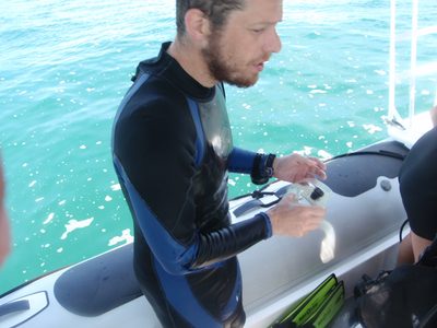 Joel suiting up before our first dive.