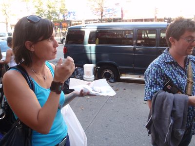 Eating cannolis.