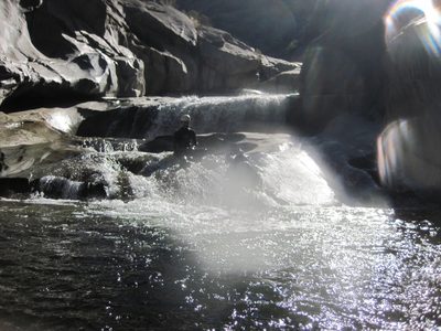 Colin, playing on a water slide.