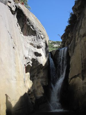 John sets up rigging to rappel the Big Kahuna.