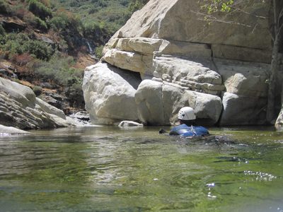 Colin floats downstream.