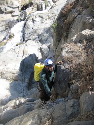Joel finds that 4th class climbing is hard in flip flops.