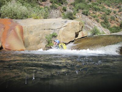 Joel on a water slide.