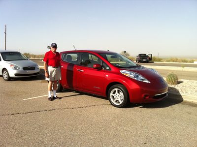 Dad, with only 34 miles of range remaining in the...