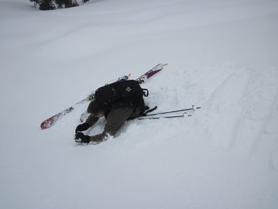 Tom, one of my classmates, takes a measurement of slope...