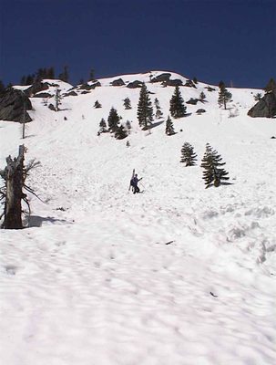 John crossing an avalanche zone near Alpine Meadows...