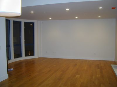 Living room as viewed from breakfast nook/dining area. ...
