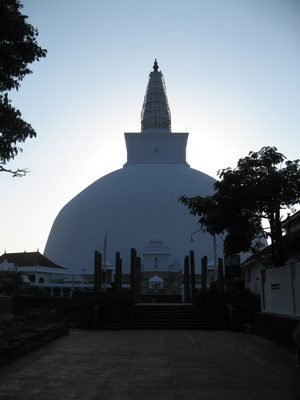 The Ruwanwelisaya Stupa with the setting sun in Sri Lanka.