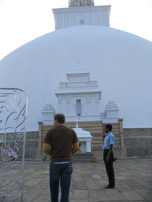 John looks around  Ruwanwelisaya stupa at Anuradhapura. ...