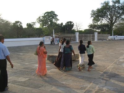 Some devotees traveling around the stupa clockwise.