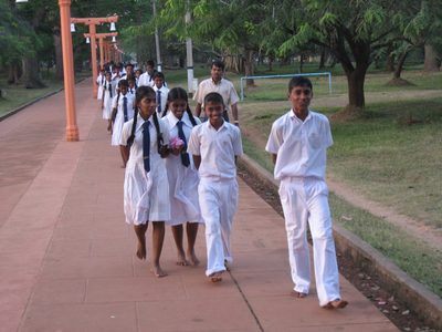 School children filing out of the temple complex at Anuradhapura.