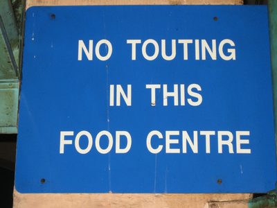 Sign in a hawker center in Little India, Singapore.