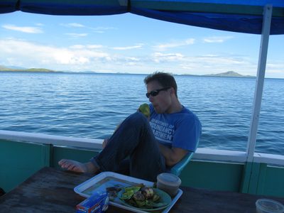 John eating an avocado aboard the S.S. Cockroach.