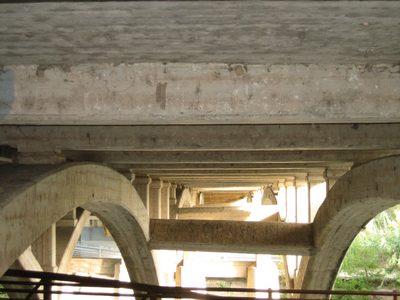 Under the bridge.