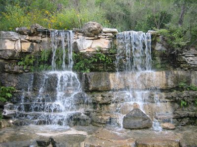 A waterfall in the prehistoric garden area (complete...