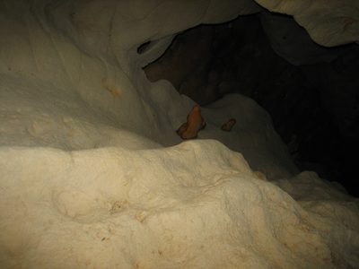 Strange mineral formations above us in the canyon.