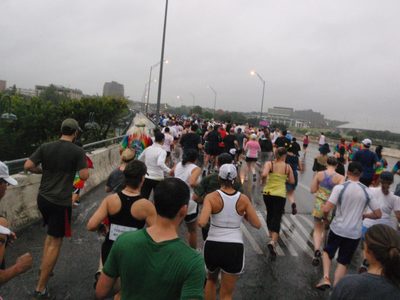 Runners heading south across the 1st street bridge over...